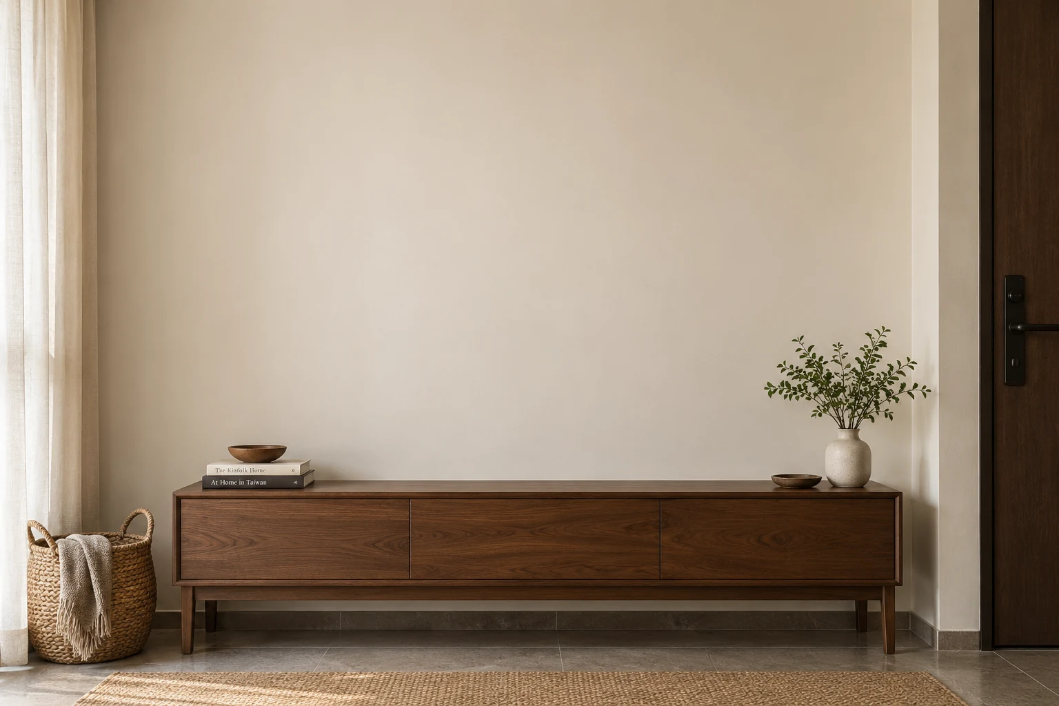 A home setting with natural light and a wooden sideboard