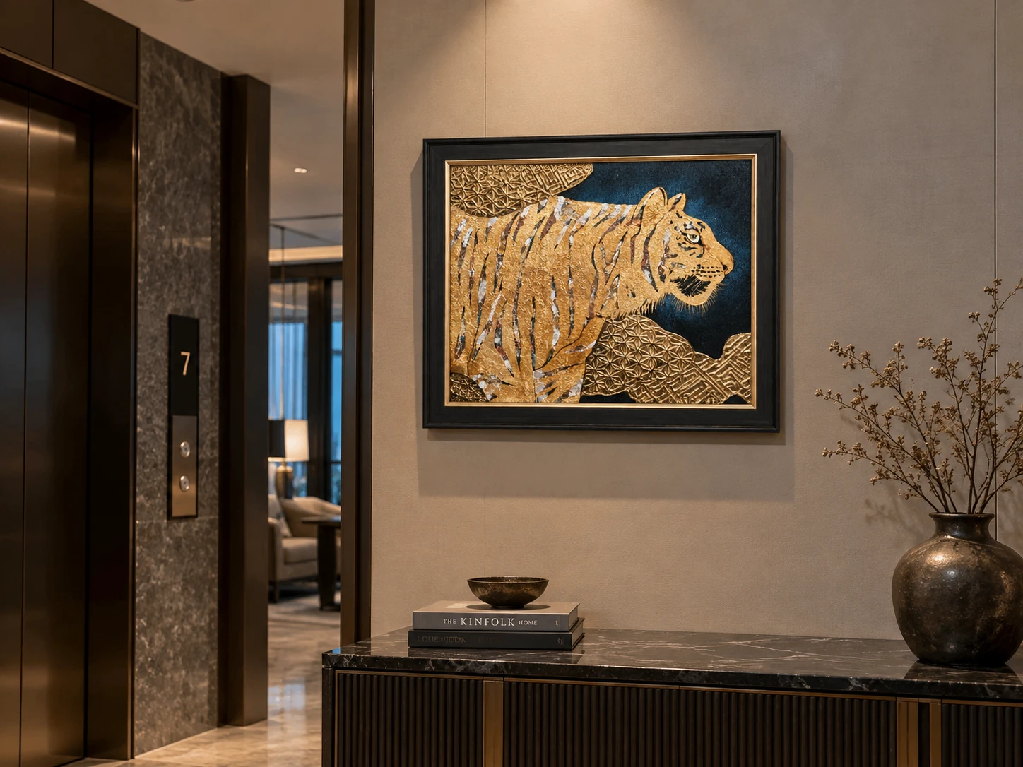 The Roar Beneath Silence above an entryway cabinet, with a stone countertop, pottery and branches; space illustration.